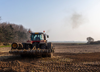 tractor plowing the land