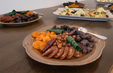 A plate with traditional georgian sweets churchhella and dried fruits