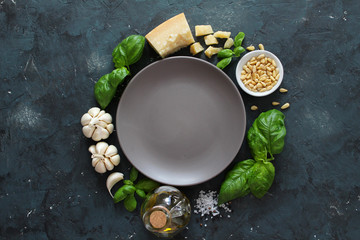 Ingredient for making traditional Italian sauce pesto: basil leaves, parmesan cheese, olive oil,...