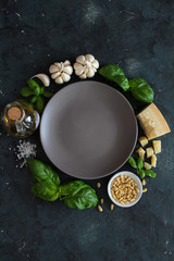 Ingredient for making traditional Italian sauce pesto: basil leaves, parmesan cheese, olive oil,...