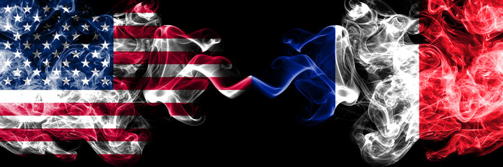United States of America vs France, French smoky mystic flags placed side by side. Thick colored...