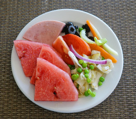 high angle view of healthy food and fruits in the plate