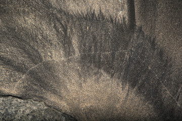 Sand texture from receiding water on a tropical beach