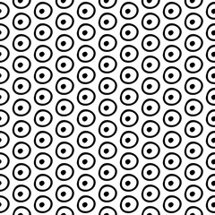 Abstract doodle pattern with hand drawn polka dots. Cute vector black and white doodle pattern. Seamless monochrome doodle pattern for fabric, wallpapers, wrapping paper, cards and web backgrounds.