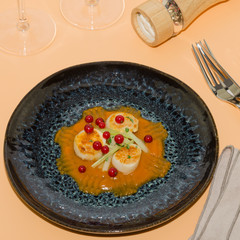Seared sea scallops with pumpkin puree and celery