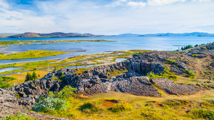 Thingvellir National park with beautiful lakes and tectonic rock formations, Iceland