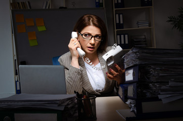 Fototapeta na wymiar Female employee suffering from excessive work 