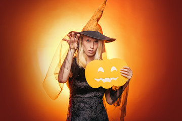 Elegant charming shy playful flirty dangerous mysterious scary female beauty. Halloween background....