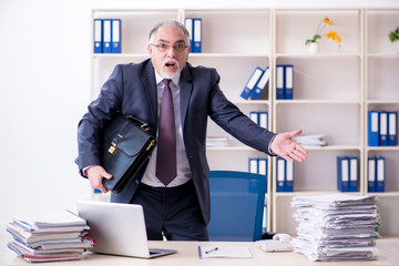 White bearded old businessman employee unhappy with excessive wo