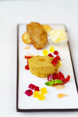 appetizer, healthy breakfast, chicken liver pate served with butter and toasts. delicious and nourishing snack