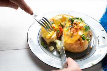 Baked potato with bacon and cheese