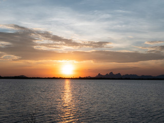 Background Beautiful landscape in the mountains and lagoon at sunset. Asia, Thailand