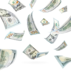 Many flying American banknotes on white background