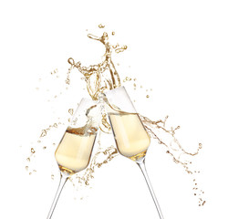 Fototapeta Glasses of champagne clinking together and splashing on white background obraz