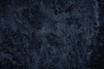 Fototapeta na wymiar Closeup of dark grunge textured background