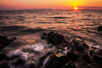 sunset over the sea , long exposure techniques