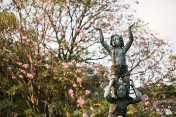 Children monument with pink flower, Bangkok