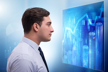 Businessman in futuristic stock trading concept