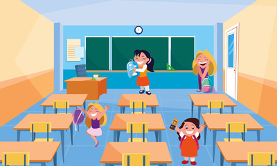 happy little school girls in the classroom