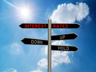 Interest rates concept 3d sign on a signpost against a sunny blue sky background