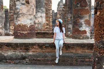 Asian tourists is visiting at Sukhothai in Thailand.Concept Travel