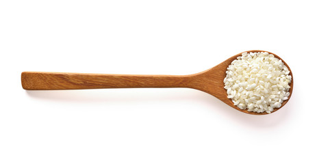 Rice in spoon wood on white background.
