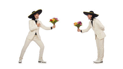 Funny mexican in suit holding flowers isolated on white