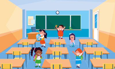 happy little school interracial girls in the classroom