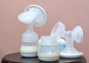 Breastmilk in bottles with Electronic pump.