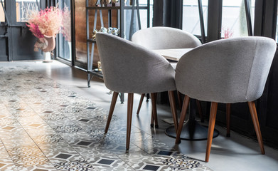 Modern chairs with table in coffee shop, bar, and cafe.
