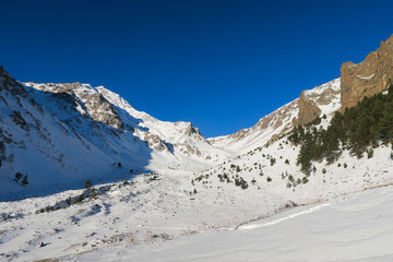 Syltran snowy valley view. Caucasian Mountains. Russia