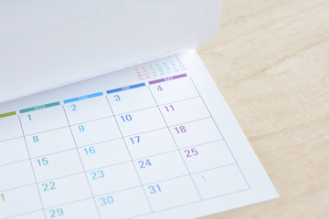 Calendar on a wooden background