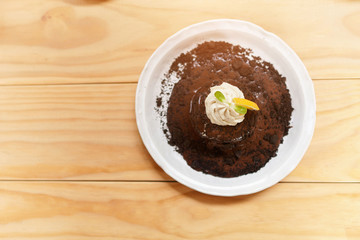 Chocolate cake on white dish