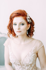 Fototapeta premium The bride in the interior Studio in the style of fine art. Wedding photo shoot in European style.