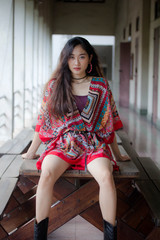 Portrait of thai china adult bohemian girl relax and smile