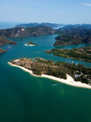 Naklejka premium Aerial view of Kilim Geoforest Park. There is sea, river, coastline, mangroves and mountains on the photo. Langkawi, Malaysia.