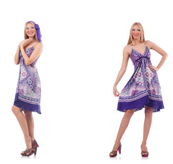 Beautiful woman in purple dress isolated on white