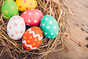Beautiful Easter multi color egg in straw