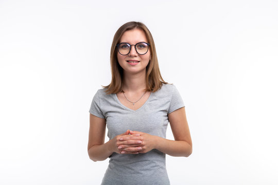 University, study, people concept - girl in glasses over the white background