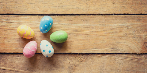Panorama colorful easter egg group on wood background and texture with copy space.