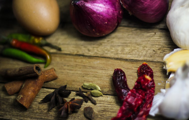 Close up of asian spices on wooden table. 