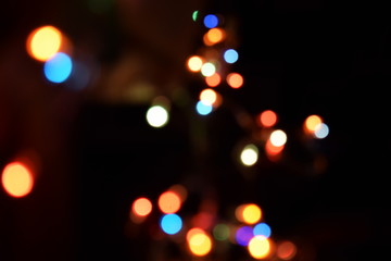 Bokeh light abstract background. Varicoloureds patches of light for background