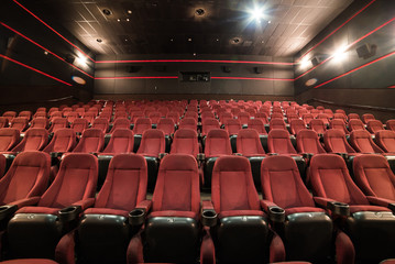 Empty cinema auditorium. Mock up.part of a theatre, or similar building, where the people who are watching and listening sit