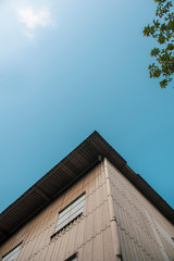 Corrugated plaster skin wall for a modern factory in Bangkok, Thailand.