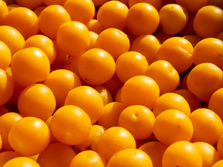 Ripe yellow cherry-plum fruits close up