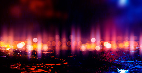 Dark empty scene, multicolored neon searchlight light, abstract bokeh light, wet asphalt, smoke,...