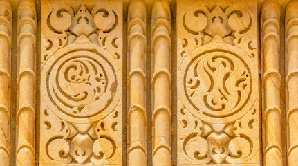 ancient indian patterns carved in stone walls