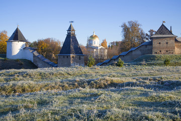 October frost near the walls of the Svyato-Uspensky Pskovo-Pechersky Monastery. Pechory, Russia