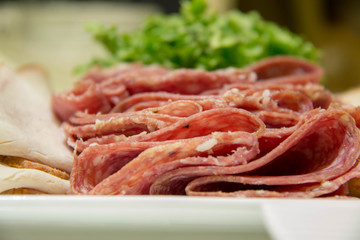  slice salami for cold cut in white plate