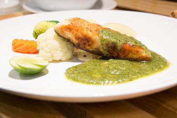  salmon steak on white plate